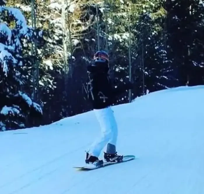 13. Learning how to snowboard.