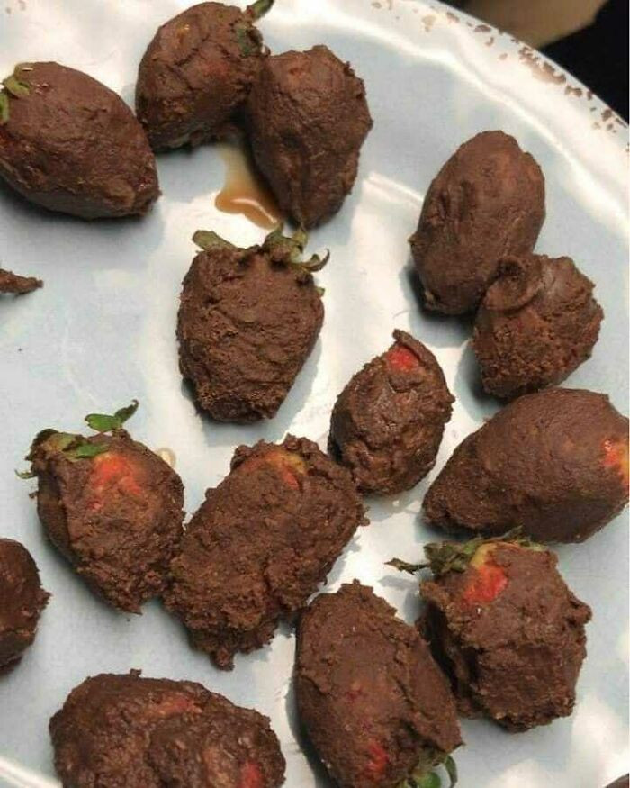 These chocolate-covered strawberries look a little sad. Don't heat your chocolate too much, because this is what will happen.