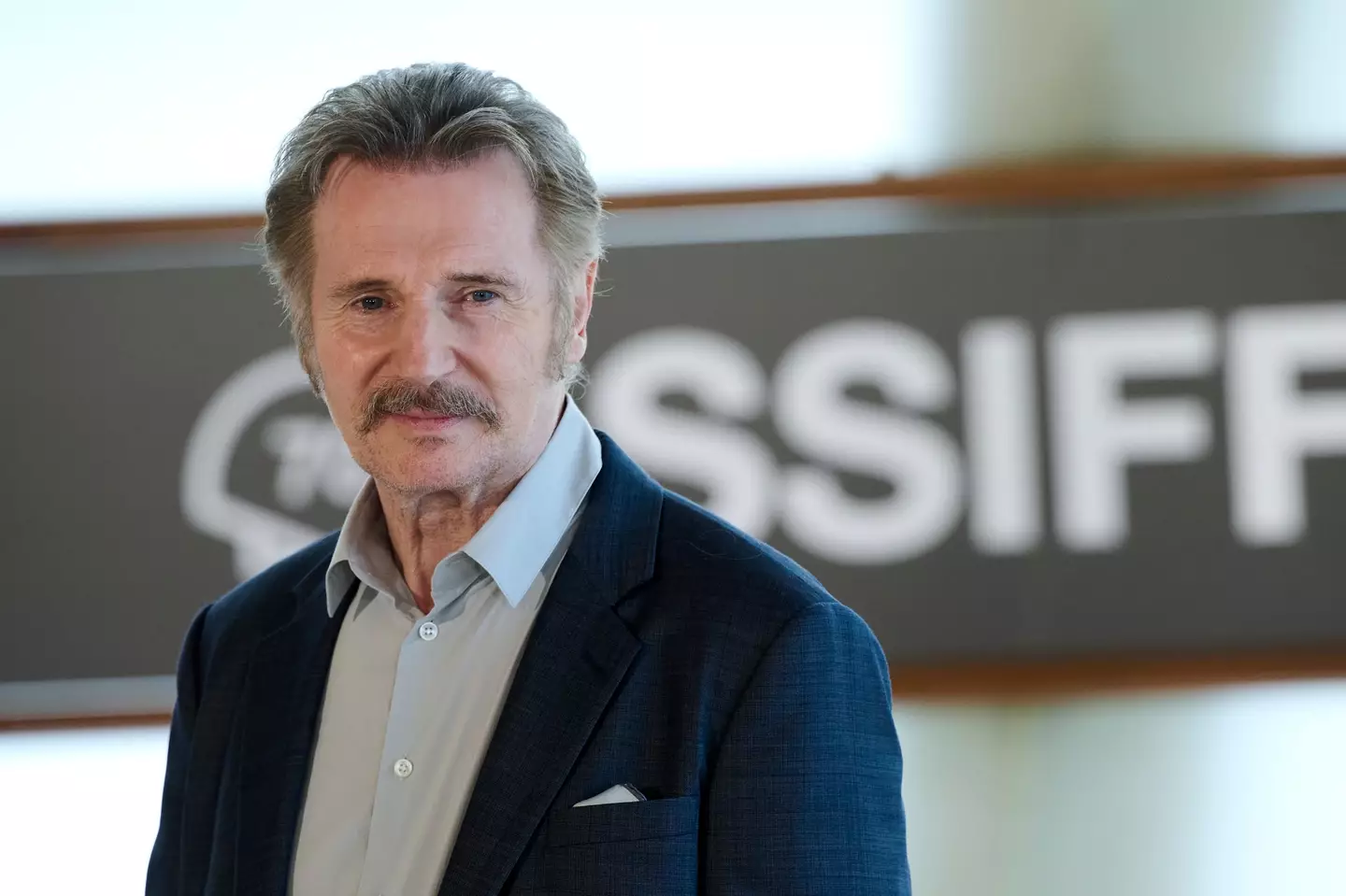 Liam Neeson brings his charm to The Naked Gun Reboot—this time with Pamela Anderson by his side!