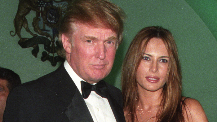 Melania and Donald Trump smiling together, emphasizing their connection and chemistry