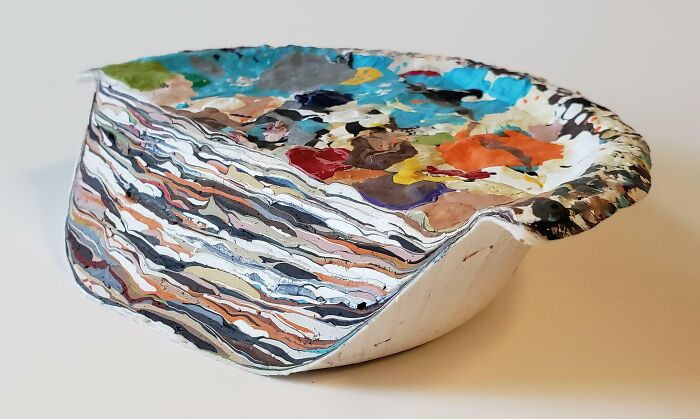 10. A cross-section of a professional painter's palette, showing its contents six months into use.
