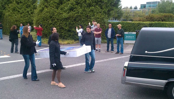 Microsoft Employees Holding A Funeral For The iPhone Following The “Success” Of Their Windows Phone
