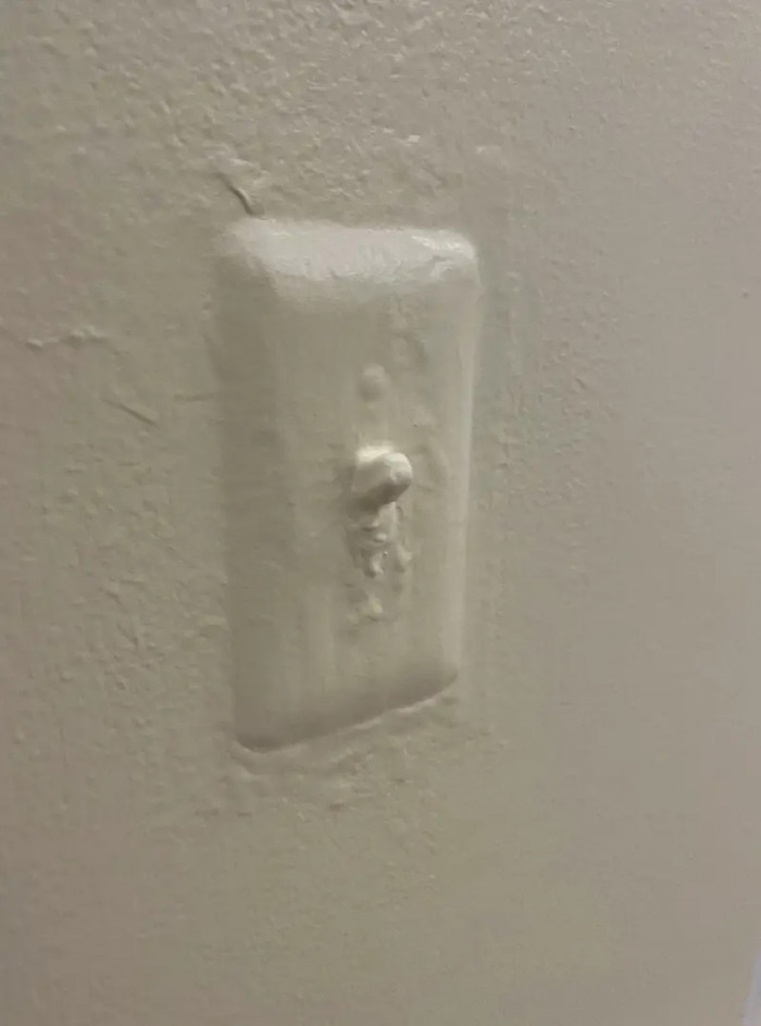 7. The landlord who slathered paint all over a light switch