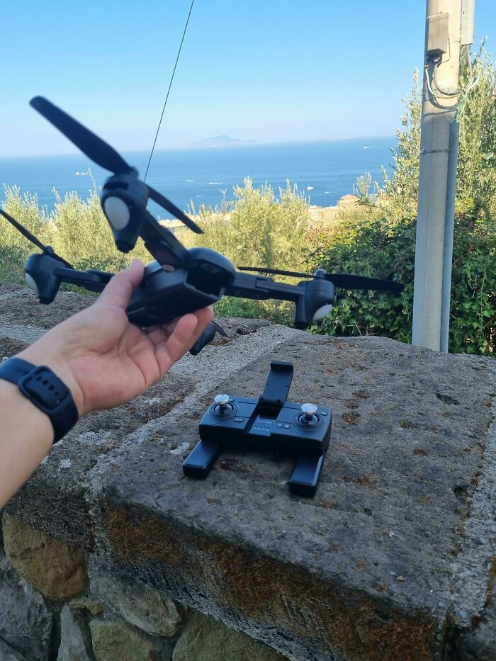 "I've Traveled Abroad And Brought My Drone To Record It, Hiked To The Top Of This Hill, And Realized That I Forgot The Batteries At Home"