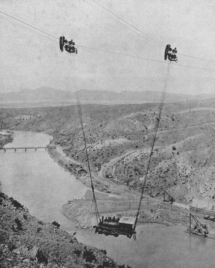 "A Steam Locomotive Is Transported Across The Rio Grande River Via A Cable In New Mexico, USA. 1915"