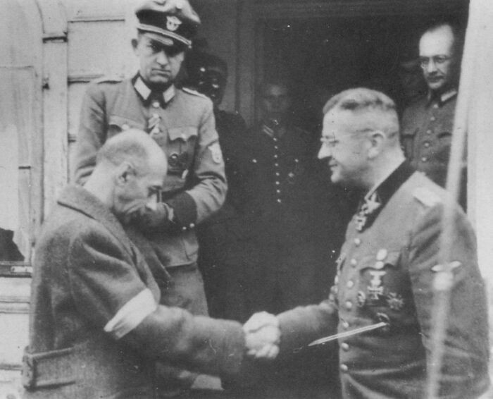 "German Propaganda Photo of Tadeusz Bór-Komorowski, the Leader of the Polish Home Army, Shaking Hands with Erich Von Dem Bach-Zelewski, the Commander of the German Forces in Warsaw, After Signing the Surrender Treaty of the Failed Warsaw Uprising (October 1944)."