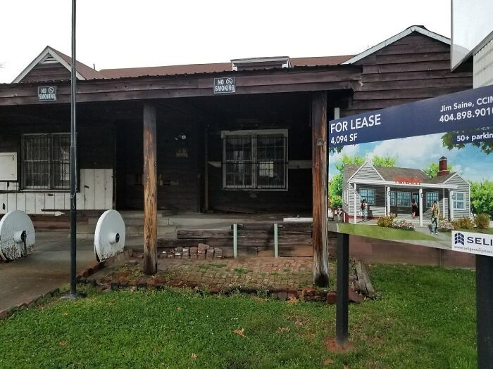 "The Picture In The Ad Clearly Is The Actual Building Behind It. [oc]"