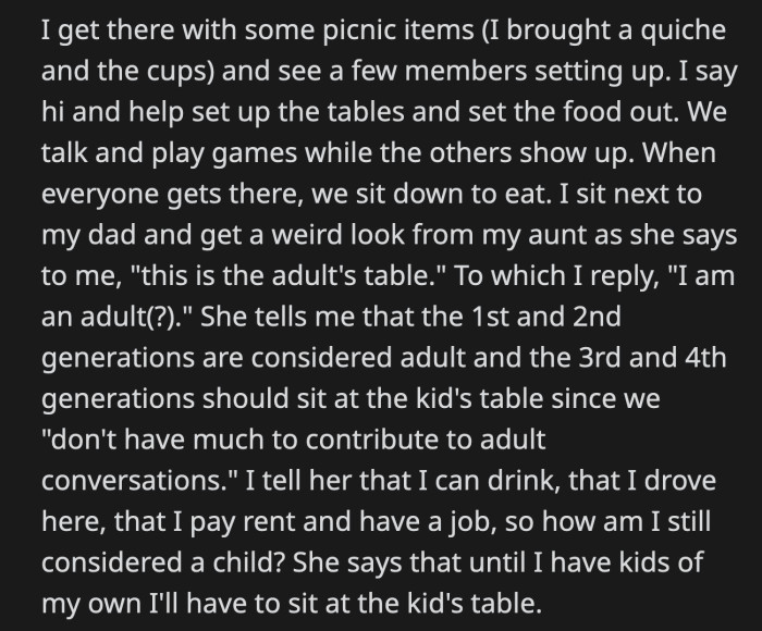 They had him sit at the table with kids because that's how they still label him as