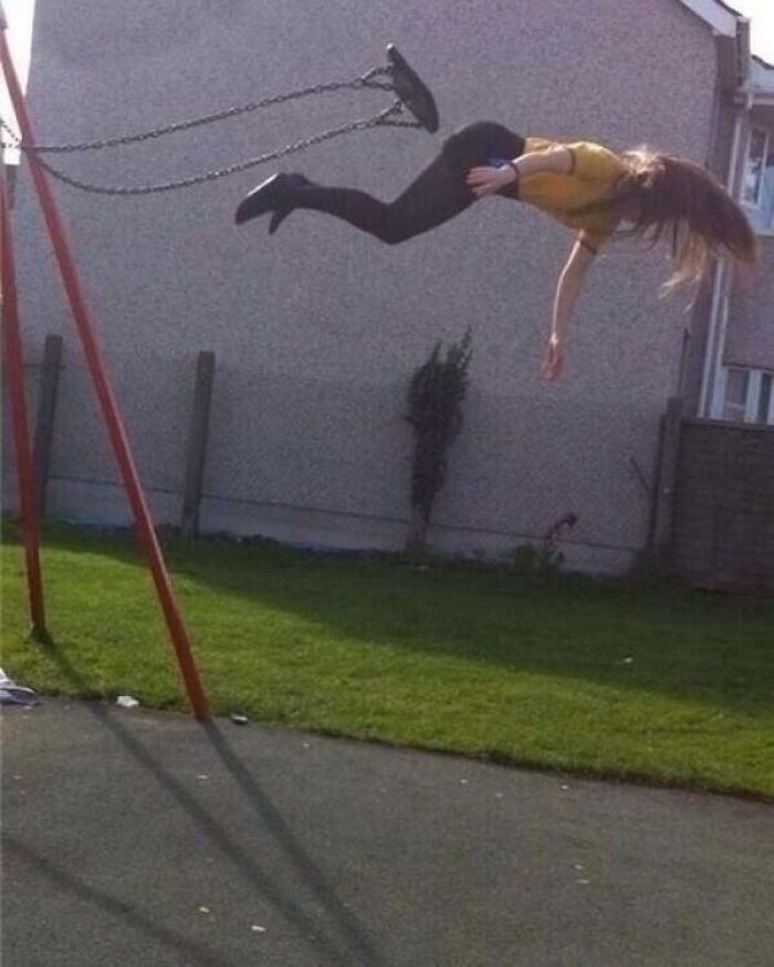 "Taken Before She Realized Jumping Off Of A Swing Was A Really Stupid Idea"