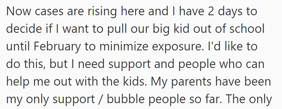 OP is considering pulling their older child out of school due to rising COVID cases, seeking support from parents who have been the main source of help.