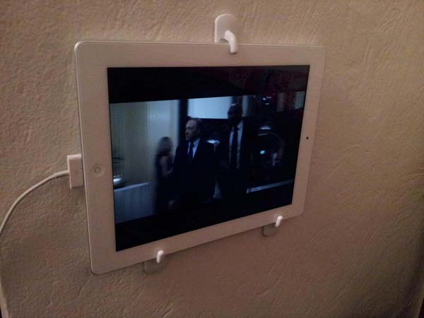 Your iPad becomes a mini TV with 3M hooks.