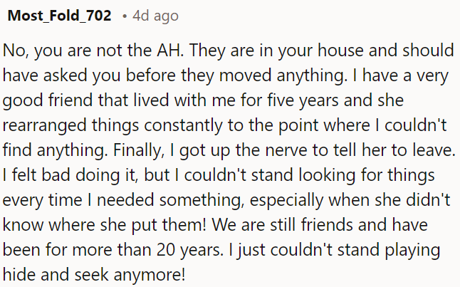 OP is not at fault; he should have asked before moving things in OP's house.