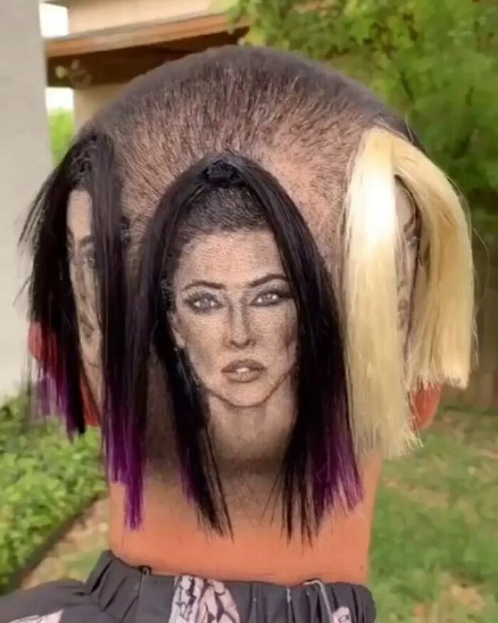 7. Two thumbs up to the hairstylist who created this creepypiece.