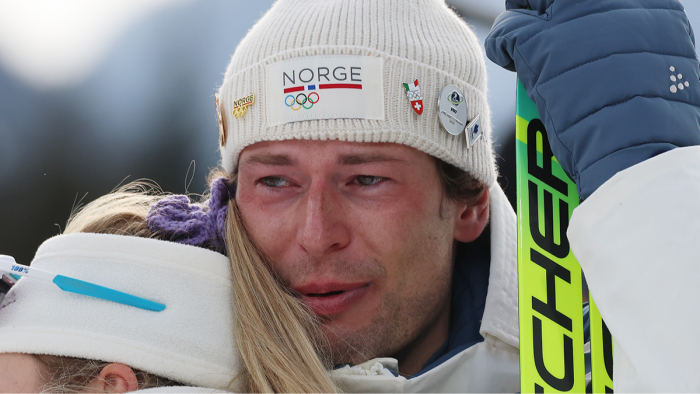 Athlete’s former girlfriend speaking to reporters, social media reaction headline.
