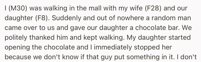 A stranger just walked over to the family and gave their 8-year-old a chocolate bar