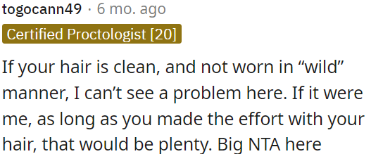 OP is not wrong if his hair is clean and well-groomed.