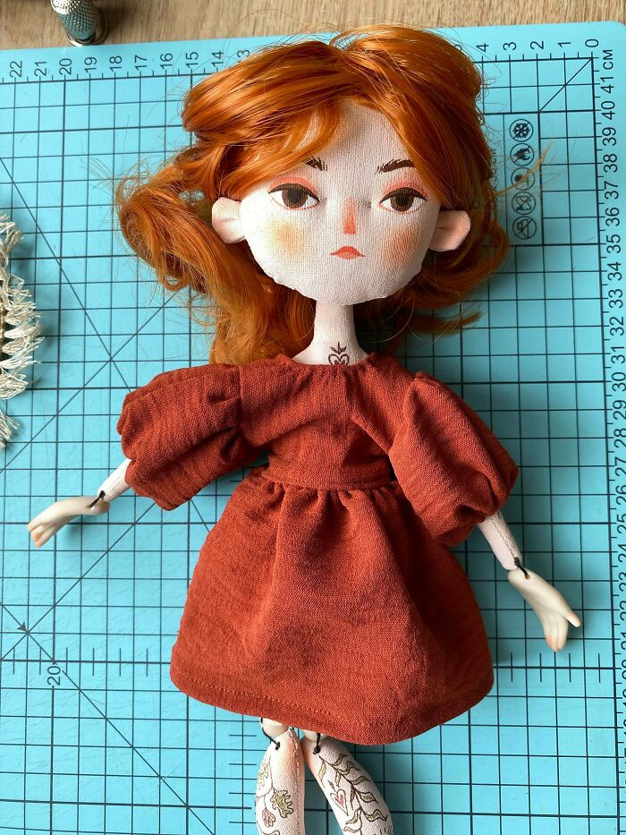 "Which Dress Suits The Doll Better? Terracotta Or Pistachio?"