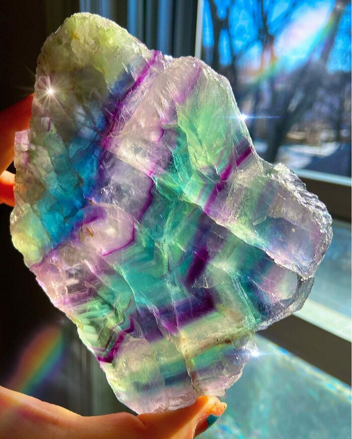 24. The prettiest natural rainbow fluorite made from bands of different colors.