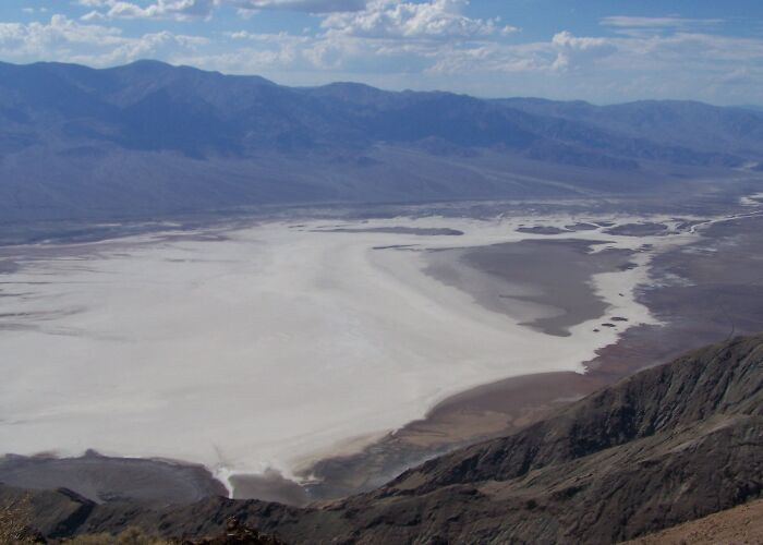 Death Valley’s dry isolation is shaped by the towering Sierra Nevada mountains.