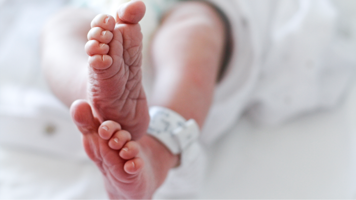Family discussing classic and spiritual baby names, emphasizing identity and belonging