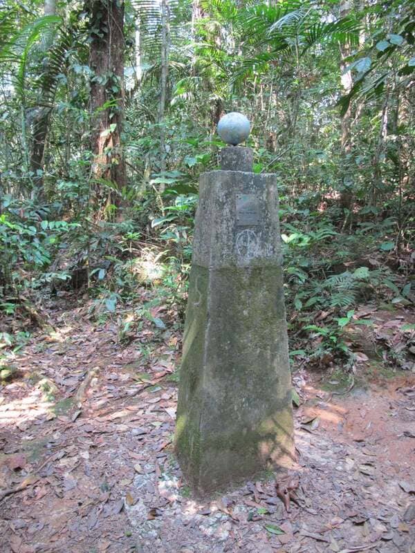 10. While hiking an isolated jungle trail in the Amazon, we came across this post marking the equator.