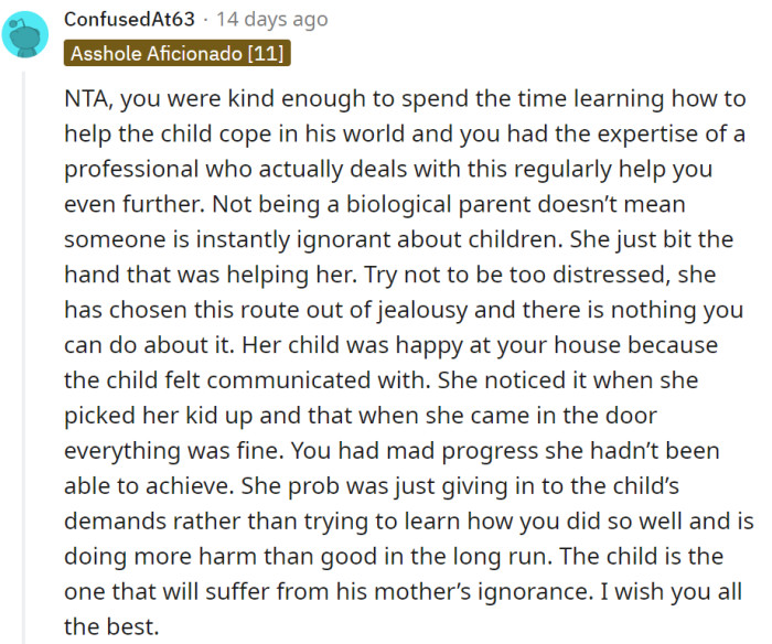 OP's efforts, with professional guidance, show their dedication to the child's well-being, and the biological parent's jealousy may harm the child's progress.