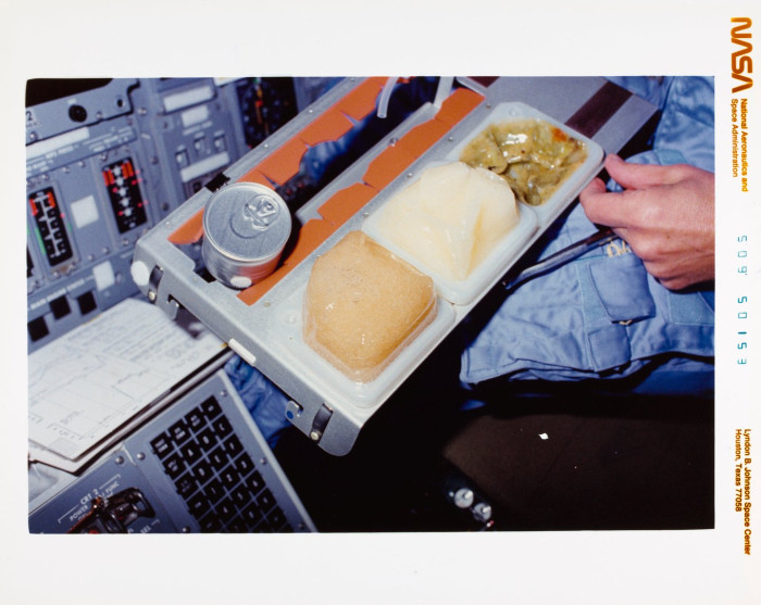 Mission control monitors showing long-duration Mars propulsion timelines and interplanetary travel planning