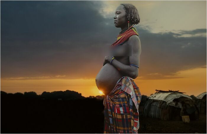 Dassanech Woman With New Life From The Series 'Tarly Morning Coffee With The Dassanech' By Kristyn Taylor