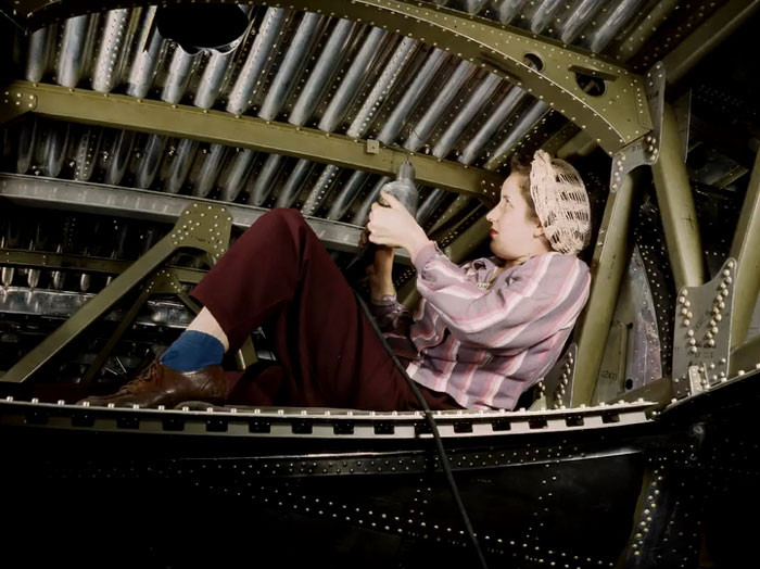 A Douglas Aircraft Company Worker Rivets An A-20 Bomber At The Plant In Long Beach, California