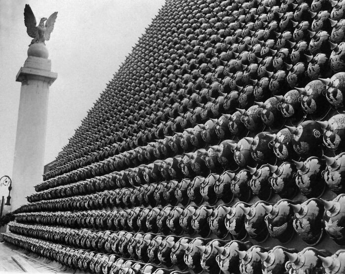 "Pyramid of WWI German Helmets in New York, 1919."