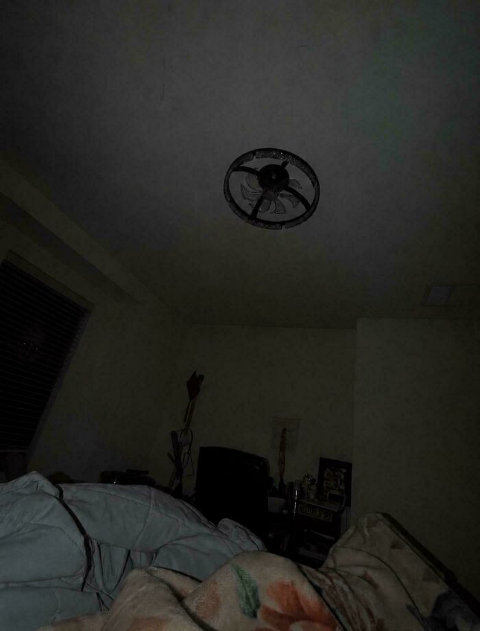 Creepy closet scene in South Africa, eerie shadow or light trick in clothing area