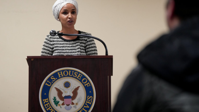 Ilhan Omar addressing crowd at town hall, residents concerned about substance attack