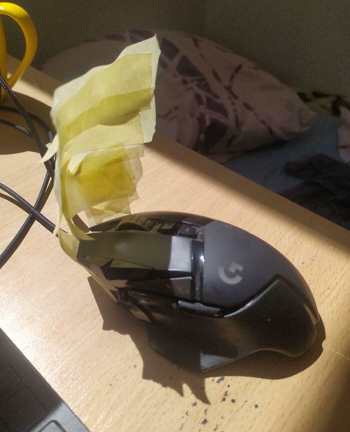"My Old Logitech's Mouse Wheel Doesn't Work In Direct Sunshine, Here's My Makeshift Fix:"