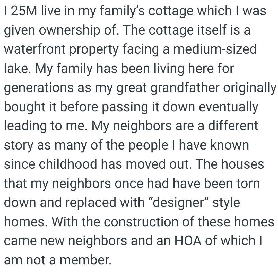 The cottage is a waterfront property facing a medium-sized lake