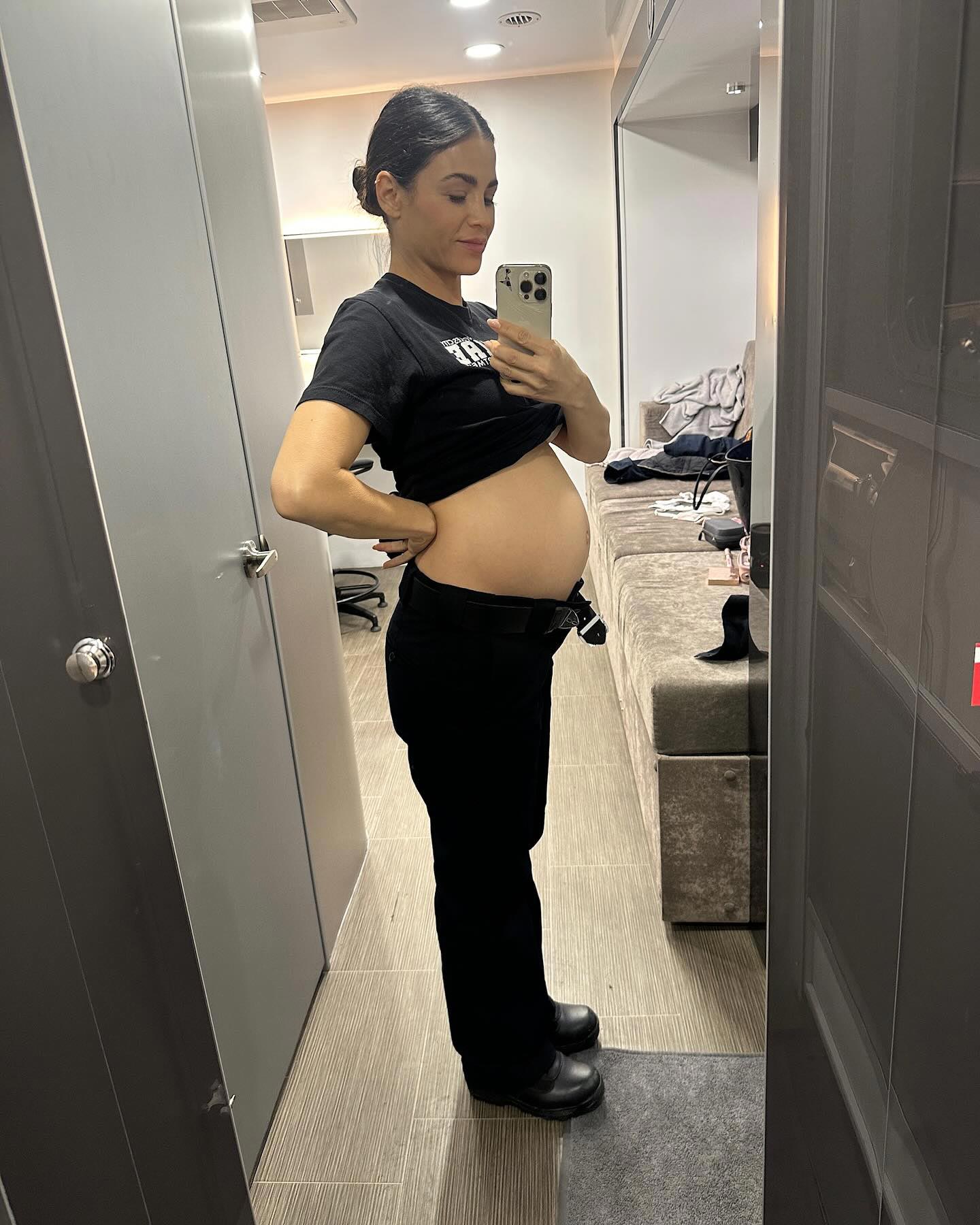 The actress is serving some serious maternity-style goals while balancing her gig on The Rookie
