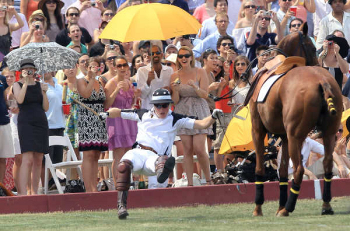 9. While competing in the Veuve Clicquot Polo Classic, Prince Harry fell off his horse