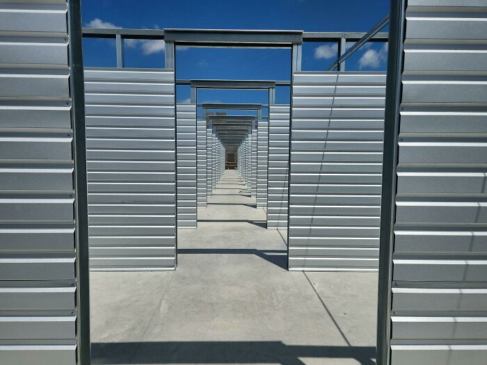 "Down The Corridor Of A Storage Facility Under Construction"
