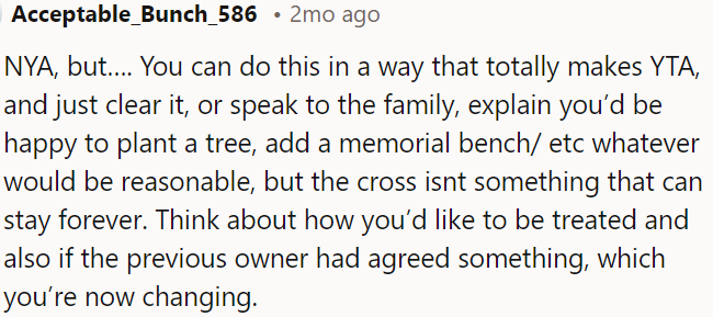 OP can consider compromises like planting a tree or adding a memorial bench, but gently explain why the cross isn't a permanent option.