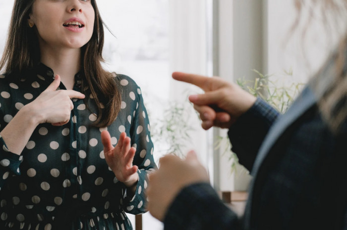 Everyone thinks she's an a-hole for not giving the money.