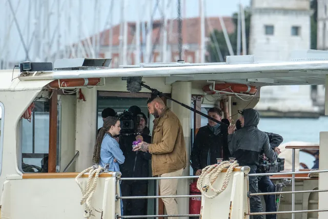 Dave Bautista and Chloe Coleman share a candid moment on the set of My Spy: The Eternal City.
