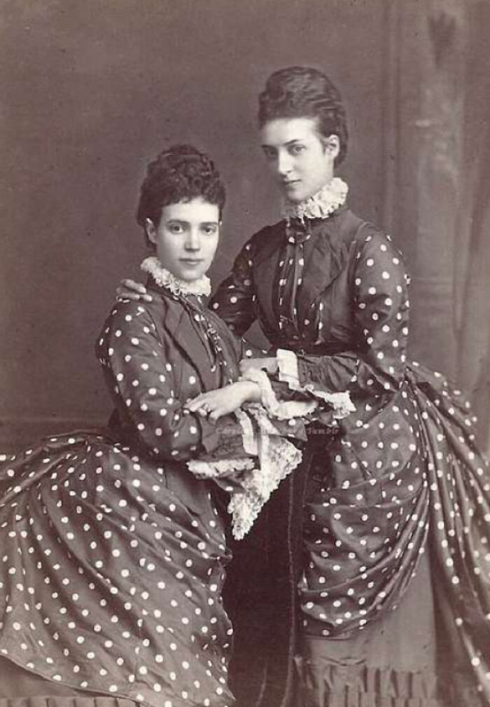 "Women In Matching Dotted Dresses With Lace Trim Sleeves, C 1875"