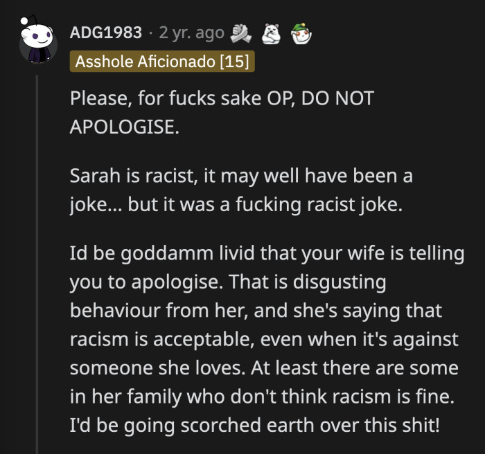 If you tolerate racism, then you are a racist. OP's wife needs to reflect on her initial reaction to make him apologize.