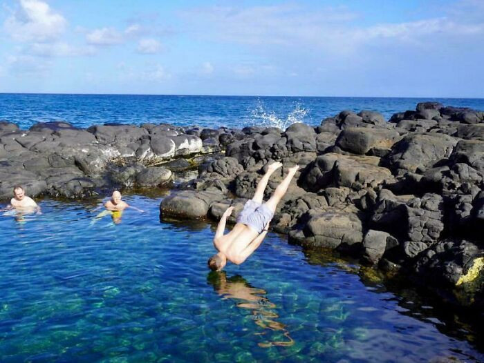 "Man Dives Headfirst Into Shallow Waters"