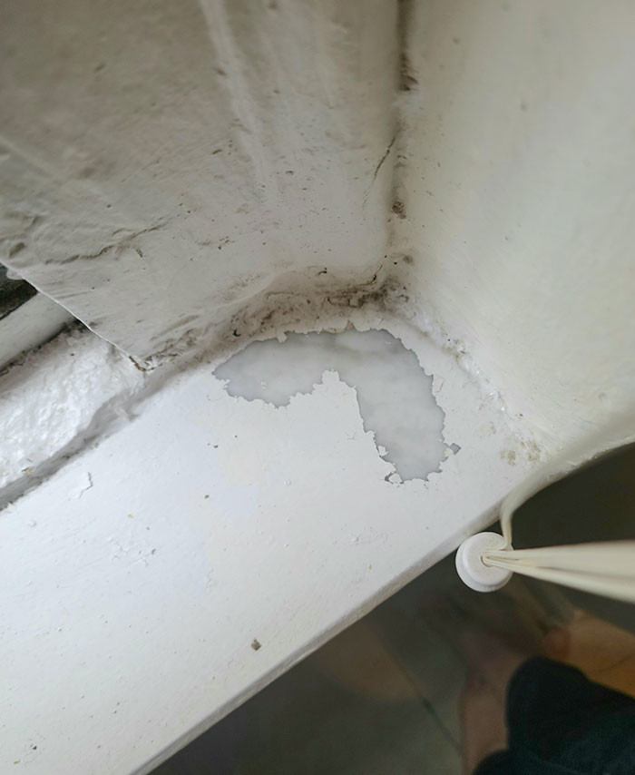 18. The layer of paint on the windowsill of my apartment is coming off. It appears that the windowsill is made of marble, which was coated with whitewash.
