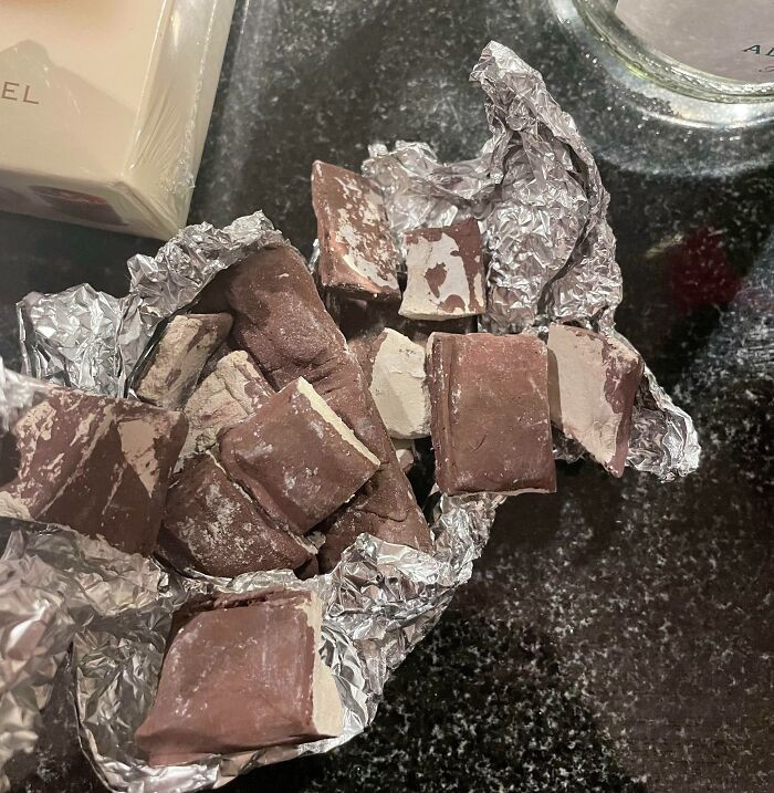 "I saw these little chocolate bars lying on the table and decided to take a bite. Turns out my brother painted solid clay brown at school today to prank me. Needless to say, he got me."