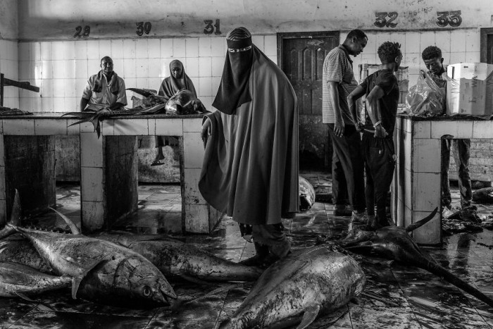 38. Woman In Fish Market From The Series 'Inside Hamar Weyne Fish Market In The Heart Of Mogadishu, Somalia' By Tariq Zaidi