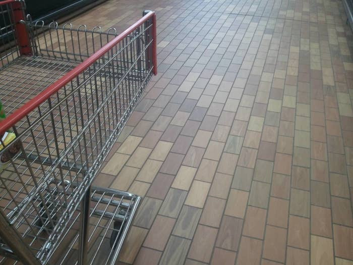 2. “What a genius idea! Brick floors in a grocery store... with small loud wheels rolling over them...?!