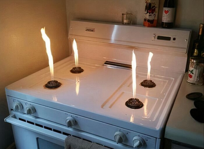"What It Looks Like When You Take The Metal Tops Off Of Gas Stove Burners"