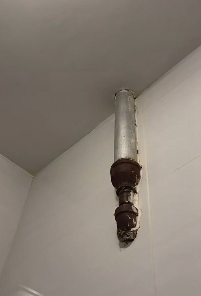 There are also pipes that are visible and seem to be rusting.