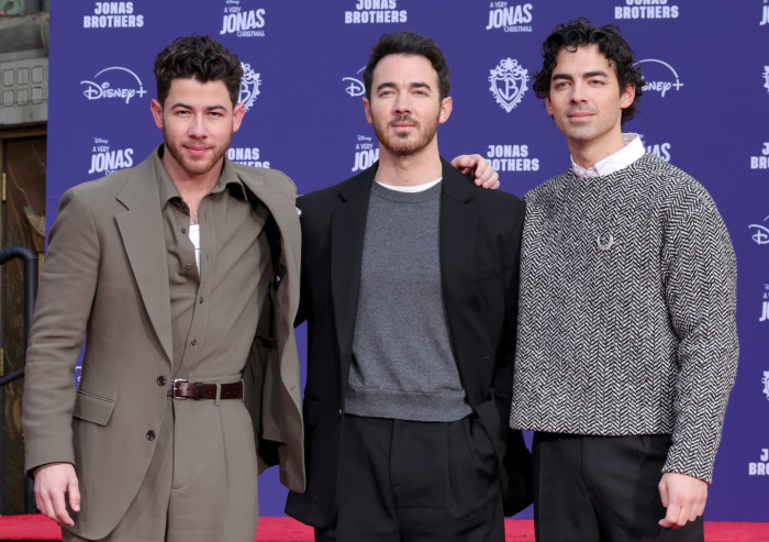 Nick Jonas on stage during live performance, addressing drug speculation rumors.